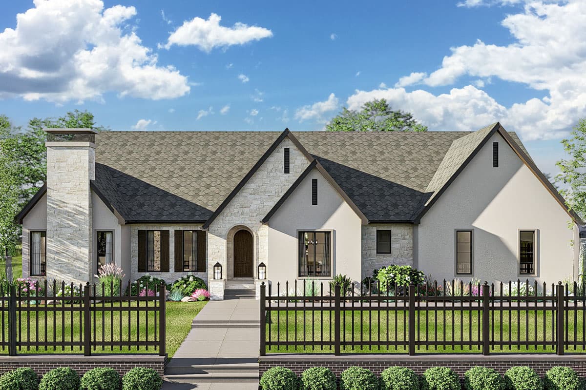 House plan exterior featuring a two-story design in a Modern style, with gabled roof, stone facade, and chimney.