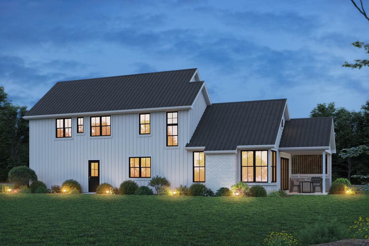 Modern Farmhouse house plan exterior with white vertical siding, metal roof, multiple gables, and covered porch with seating.