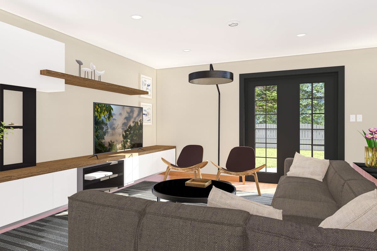 Living room with large entertainment center, modern chairs, sectional sofa, and double doors to yard.