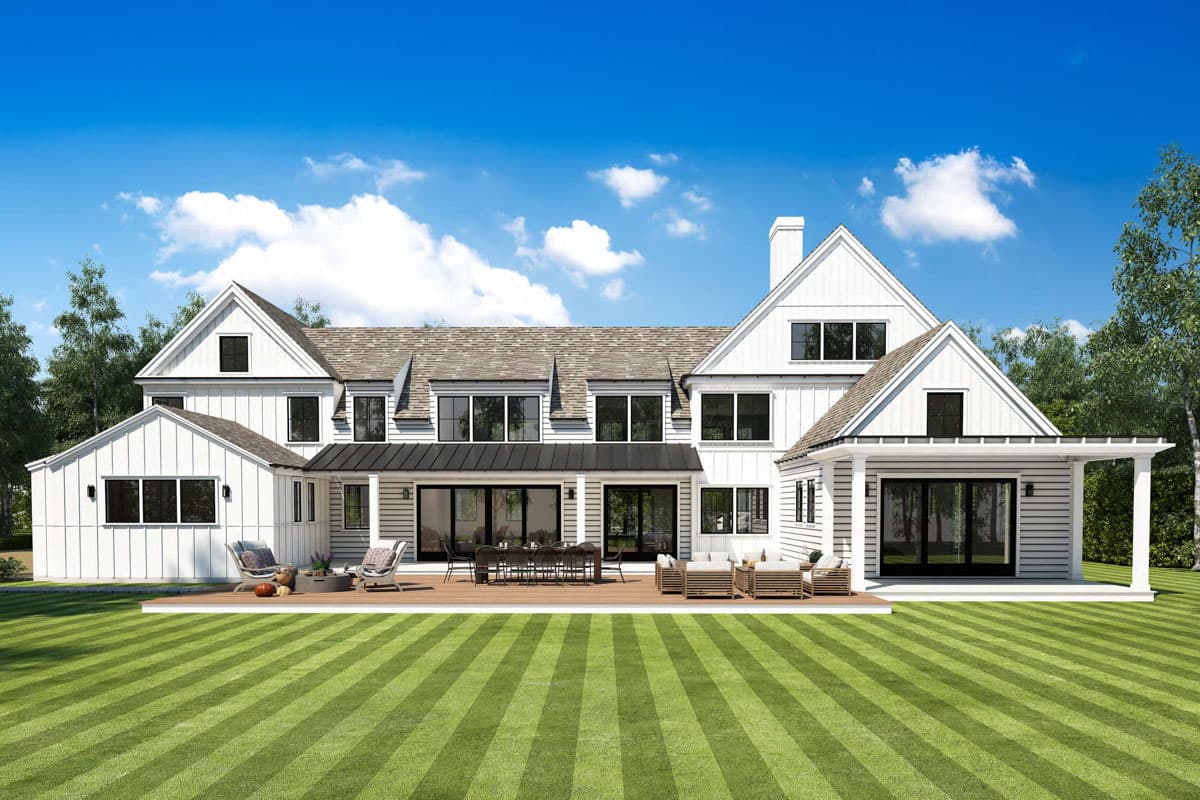 House plan exterior of a Modern Farmhouse style home with multiple gables, dormers, and a large rear deck.