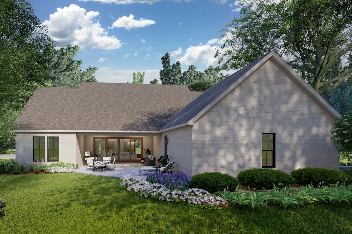 House plan exterior: Single-story Modern Farmhouse with brick facade, gable roof, and covered patio with sliding glass doors.