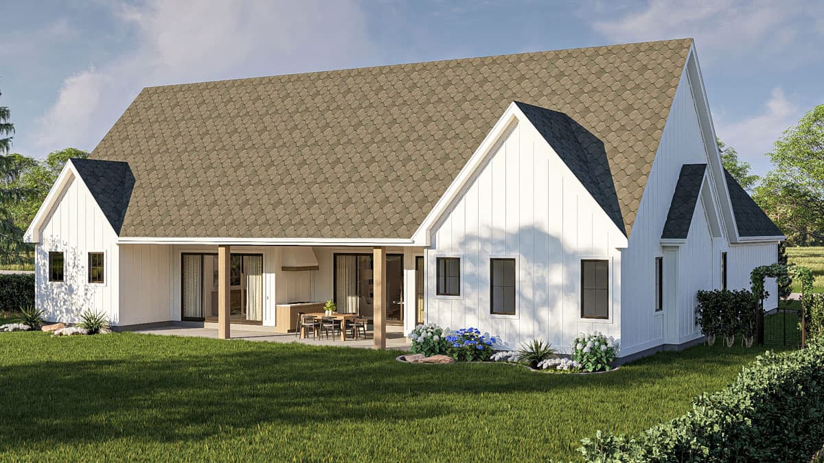 Modern Farmhouse house plan exterior with gables, covered patio with outdoor kitchen, and white board-and-batten siding.