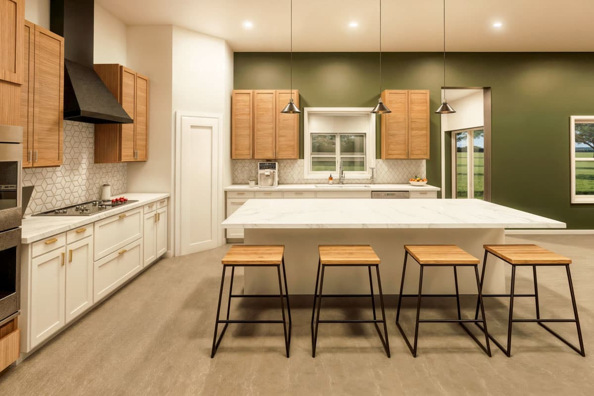 Kitchen with white perimeter cabinets, wood upper cabinets, large island with seating, and green accent wall.