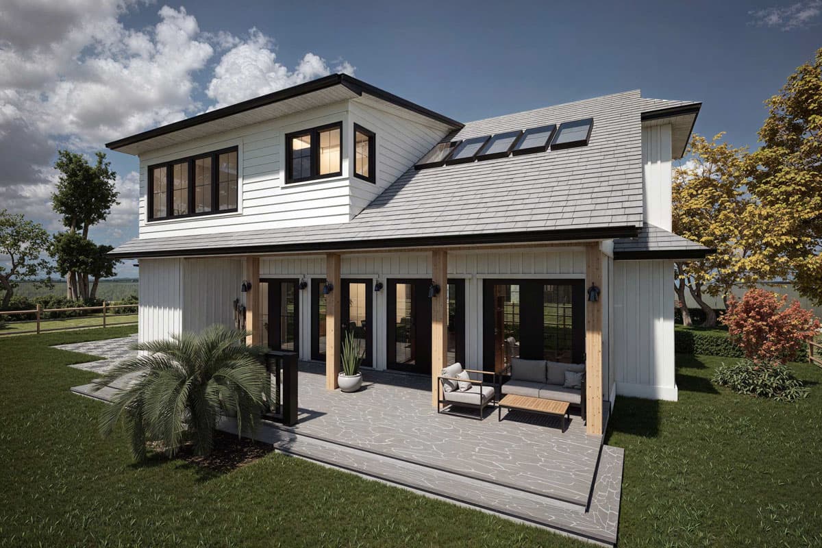 Modern two-story house plan exterior with a covered porch, multiple gables, and skylights. Features horizontal siding and dark-framed windows.