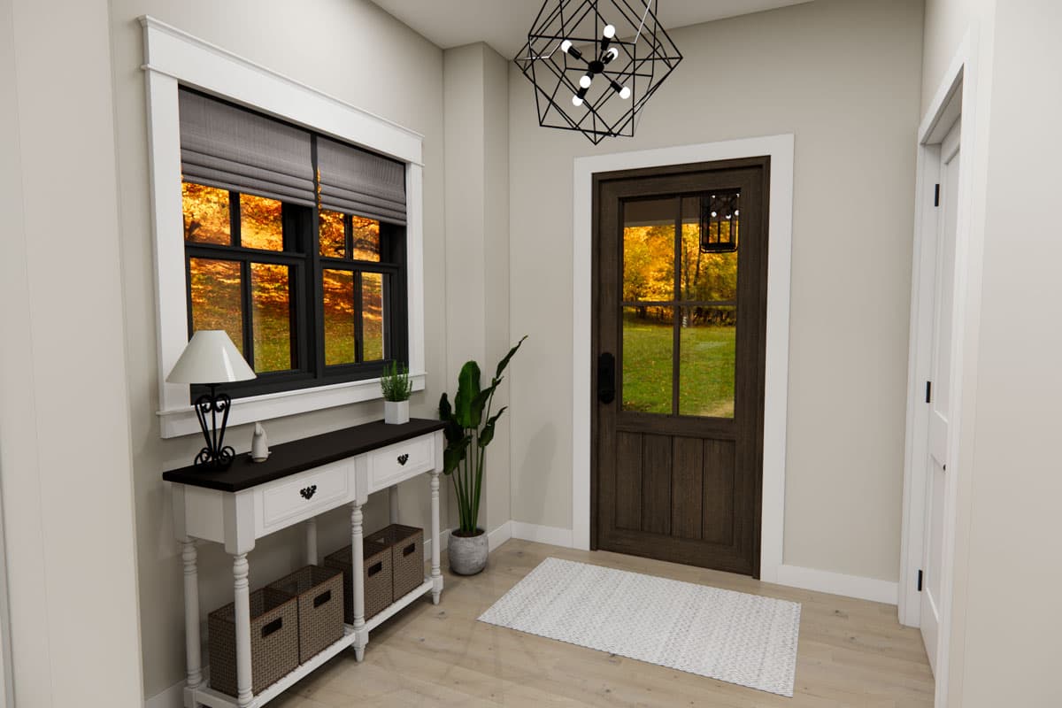 Interior entryway with wood door, window with grid panes, console table, and geometric chandelier.
