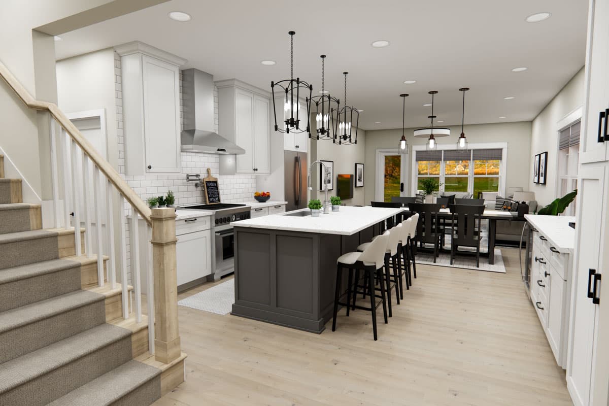 Modern farmhouse kitchen with white cabinets, gray island, stainless steel appliances, island seating, and adjacent dining area with large windows.