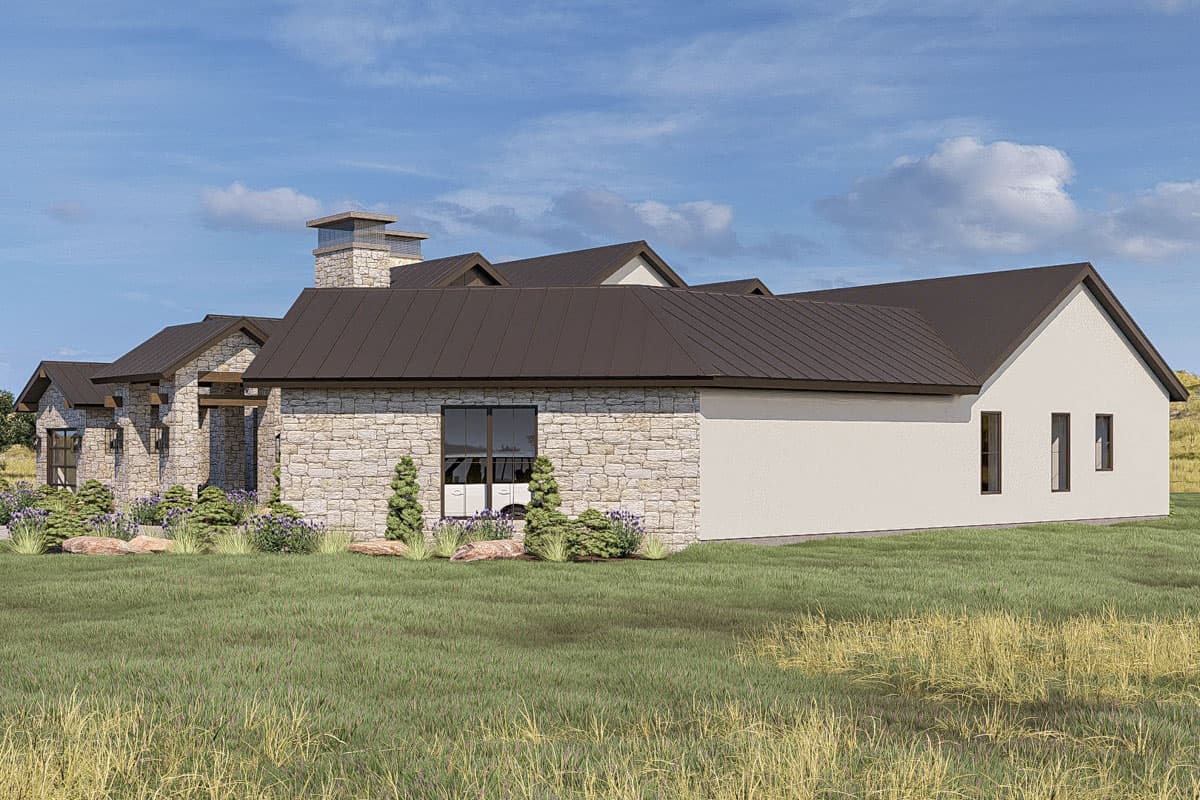 House plan exterior with stone accents, dark metal roof, gabled dormers, and dual chimneys.