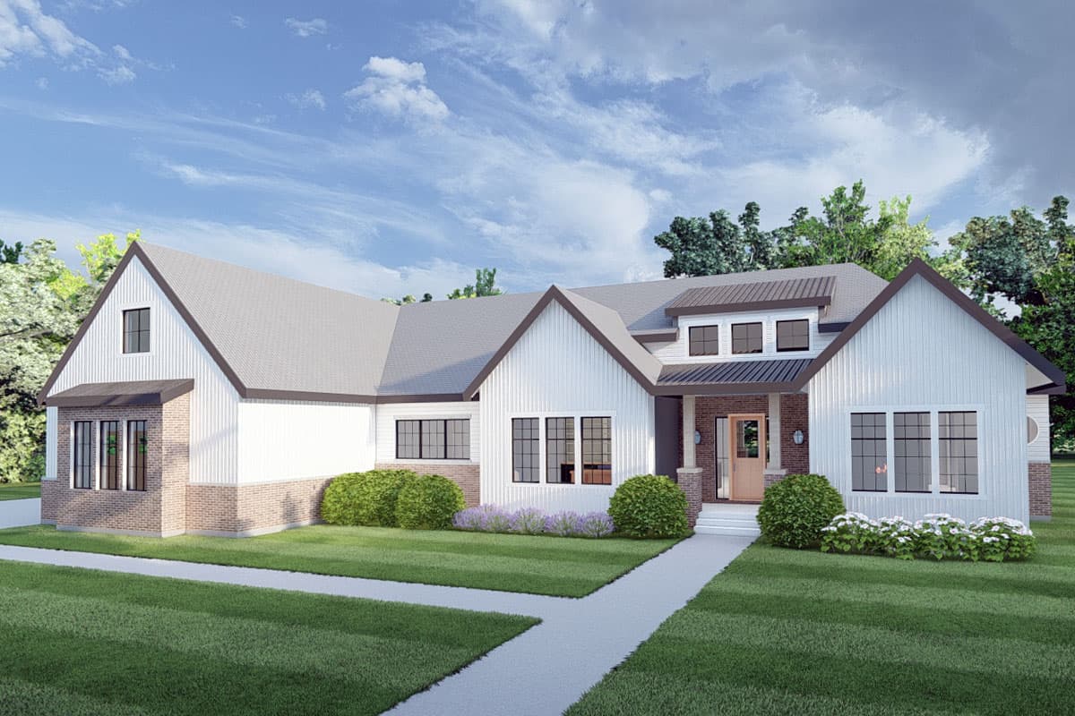 House plan exterior. Modern Farmhouse style with gabled roof, brick accents, and a covered front porch. Features include dormers and multiple windows.