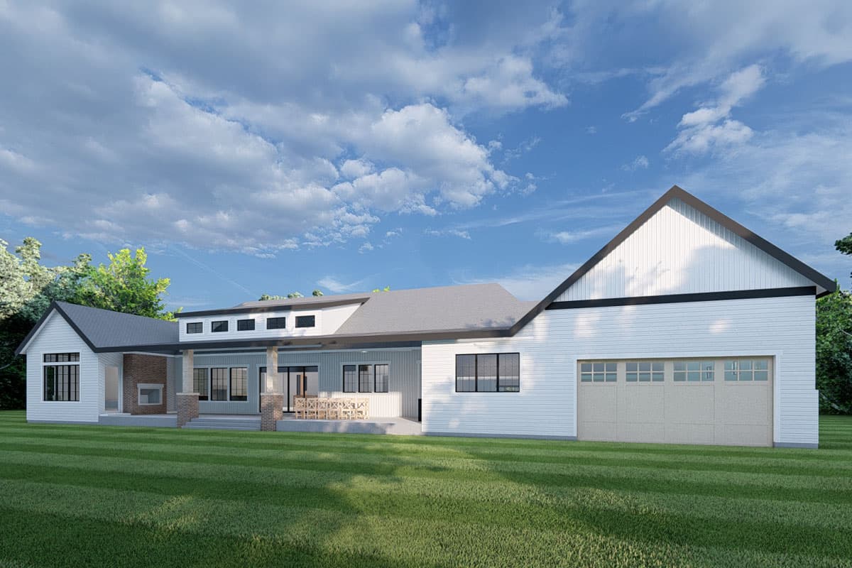 House plan exterior: Modern Farmhouse style, two stories, white siding, covered patio, gabled roof, and attached garage.