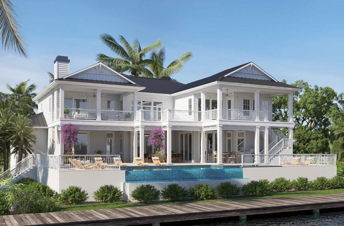 Two-story house plan exterior with wrap-around porches, multiple gables, and a metal roof.