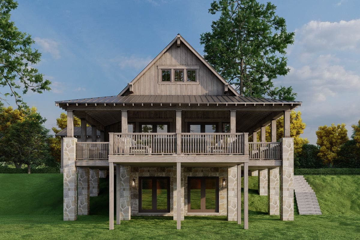 Modern Farmhouse house plan exterior with a full-width porch, metal roof, stone foundation, and gable dormers.