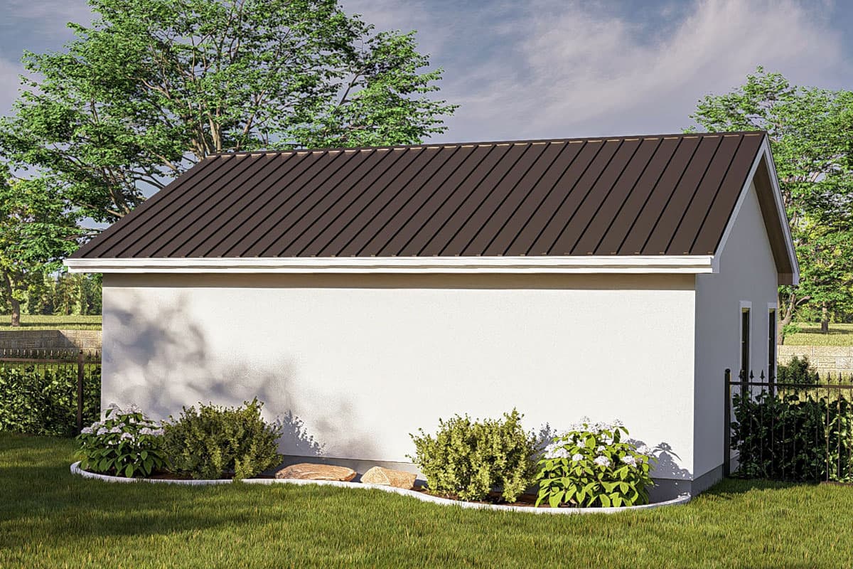 House plan exterior view of a simple gable-roofed structure with white stucco walls and a dark metal roof.