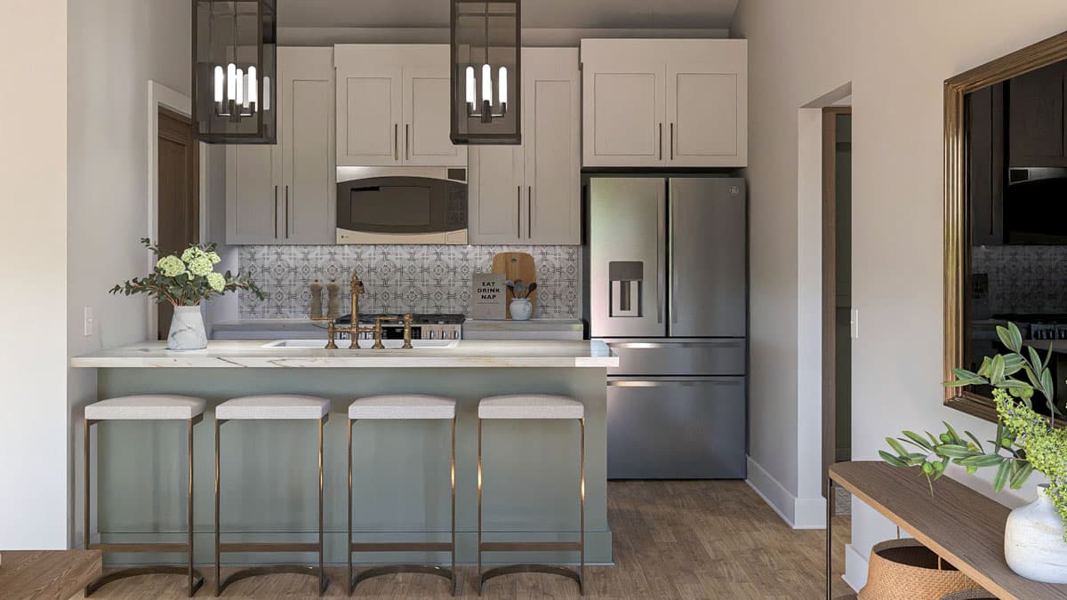 Modern kitchen with gray cabinets, marble-look counters, island with seating, stainless steel appliances, and patterned backsplash.