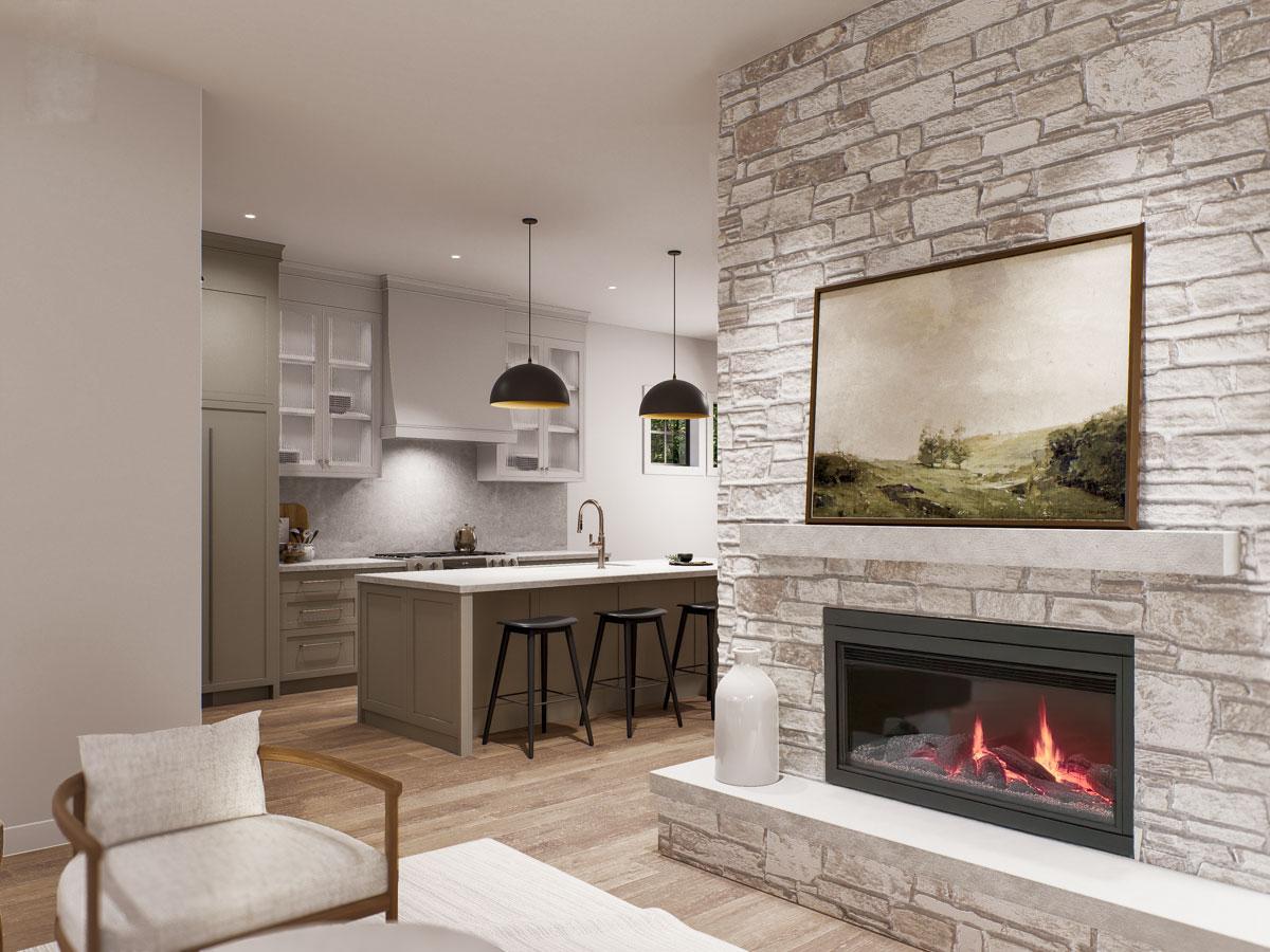 Open concept living area featuring a stone fireplace, a large kitchen island with pendant lights, and modern cabinetry.