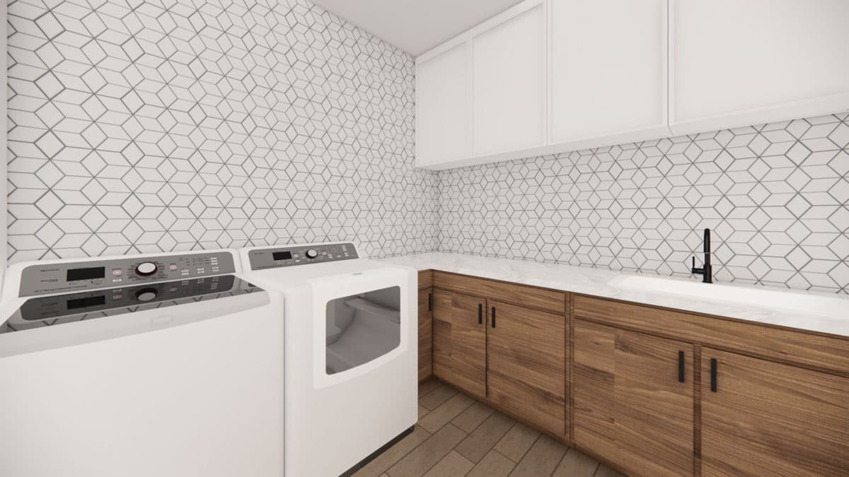 Modern laundry room featuring a white and gray geometric tiled wall, wooden cabinets, and white appliances with a sink and faucet.