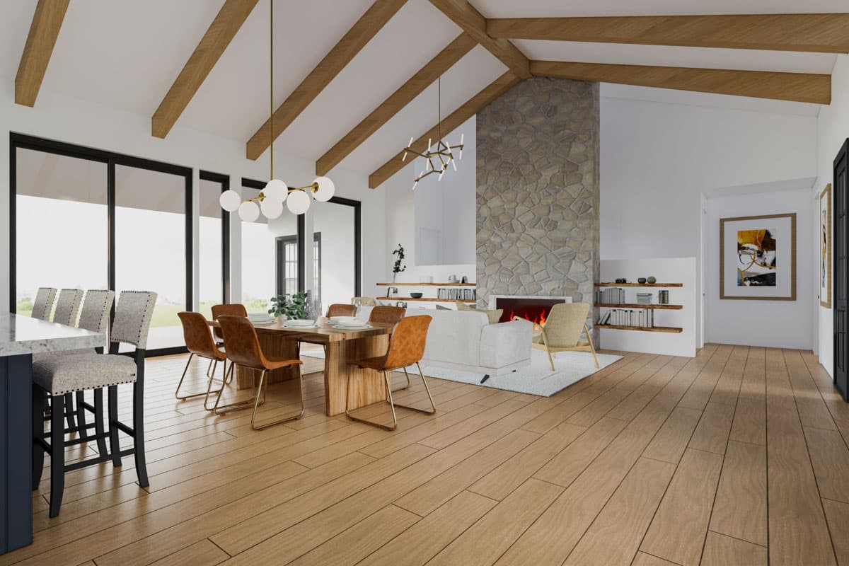 Interior rendering of a great room with vaulted ceiling, exposed beams, stone fireplace, dining area, and island.
