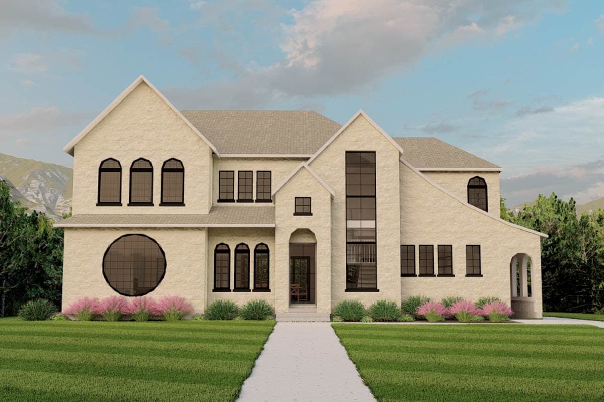 House plan exterior with two stories, gabled roof, arched windows, and a circular window feature. Front entry with portico.