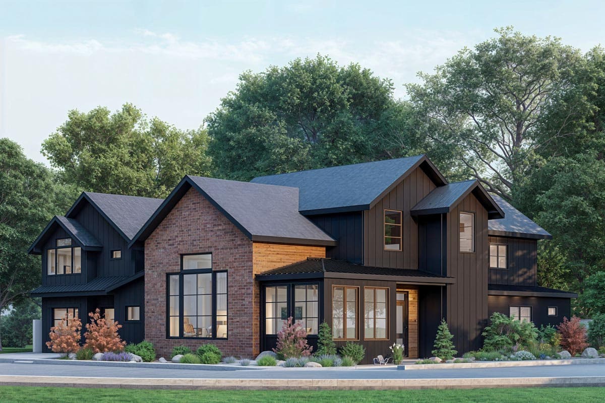 Modern farmhouse house plan exterior with brick and dark siding, multiple gables, and large windows.