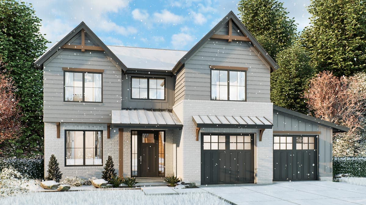 A two-story modern house with a gray exterior, white brick accents, and a covered entryway. Snow falls lightly on the roof and landscaping.