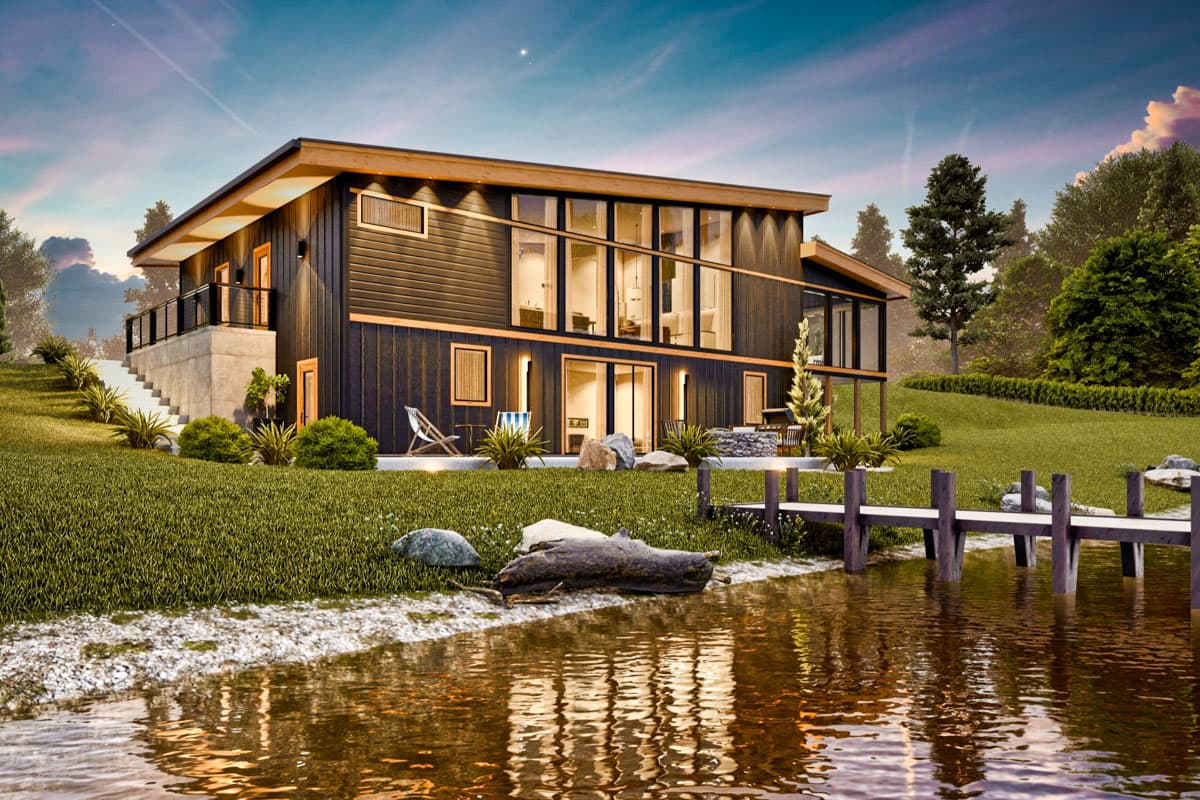 Modern house plan exterior with dark vertical siding, a flat roof, a second-story deck, and large windows overlooking water.