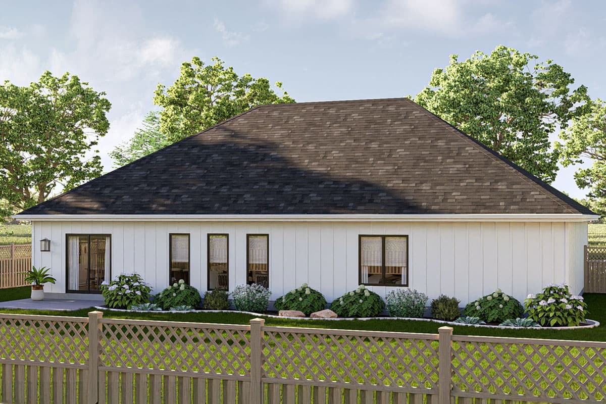 House plan exterior: Modern Ranch style, single story, with a large gable roof and sliding glass doors.