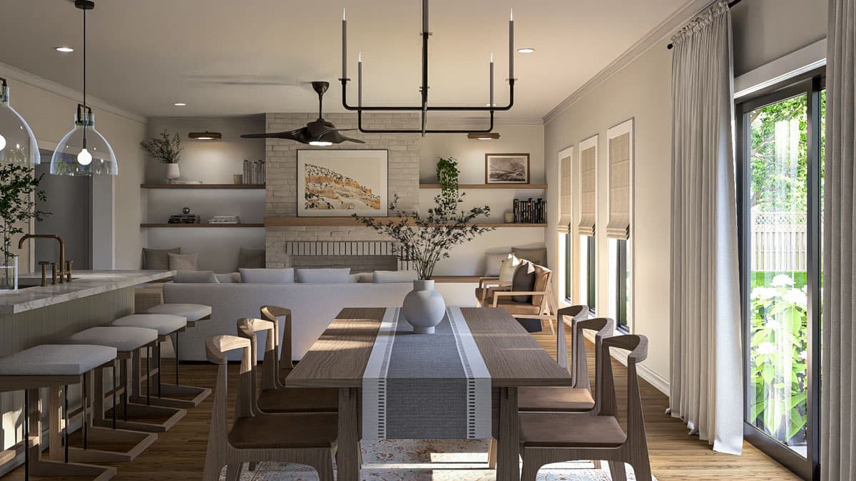 Open concept living area with kitchen island, dining table, fireplace, and seating area. Large windows with sheer curtains.
