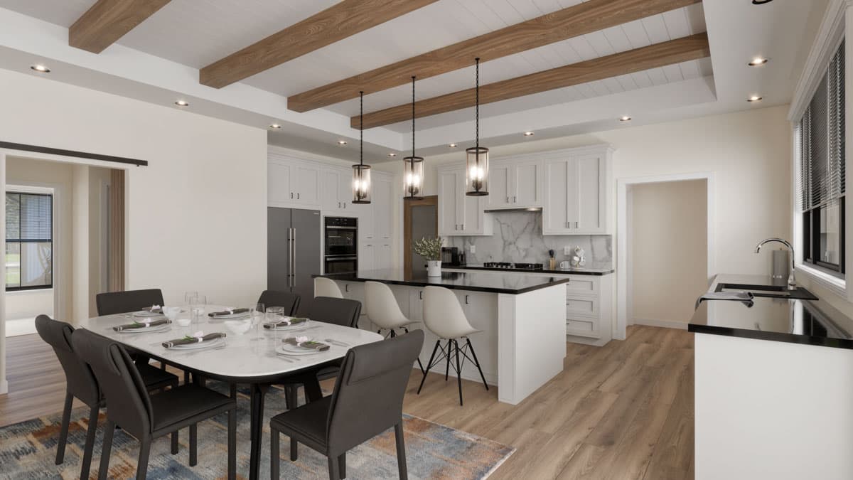 Dining area and kitchen with white cabinetry, island, black countertops, and exposed wood ceiling beams.