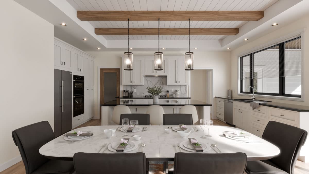 Kitchen and dining area with island, pendant lights, shaker cabinets, stainless steel appliances, and large window.
