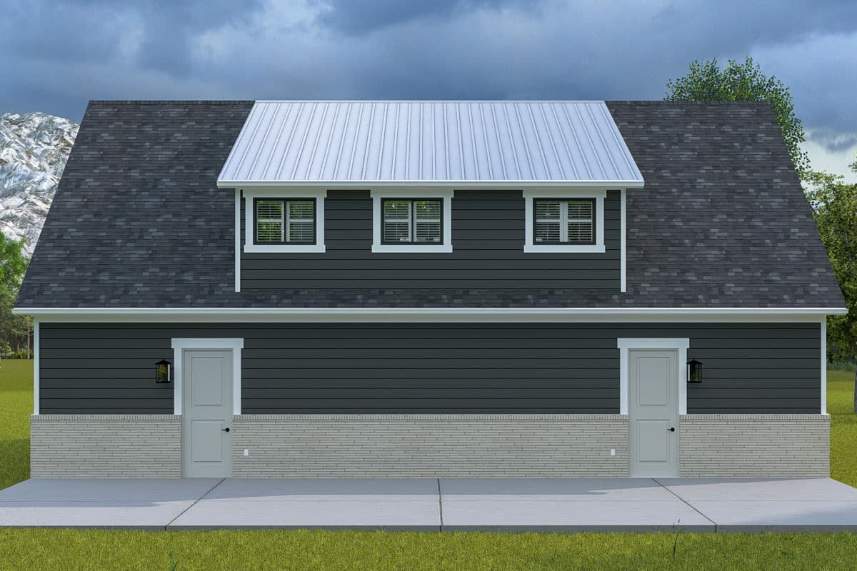 House plan exterior: Two-story, dark gray siding, brick base, two doors, and a contrasting metal roof dormer with three windows.