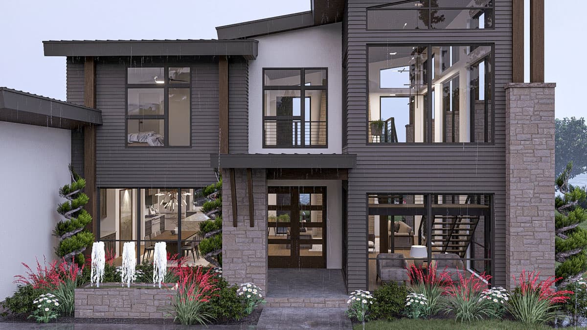 Modern house plan exterior with multiple stories, dark siding, stone accents, large windows, and a covered entrance.