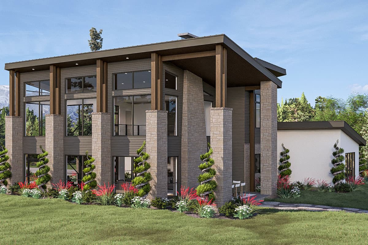 Modern house plan exterior with stone accents, expansive windows, wood-clad columns, and a multi-level roof.