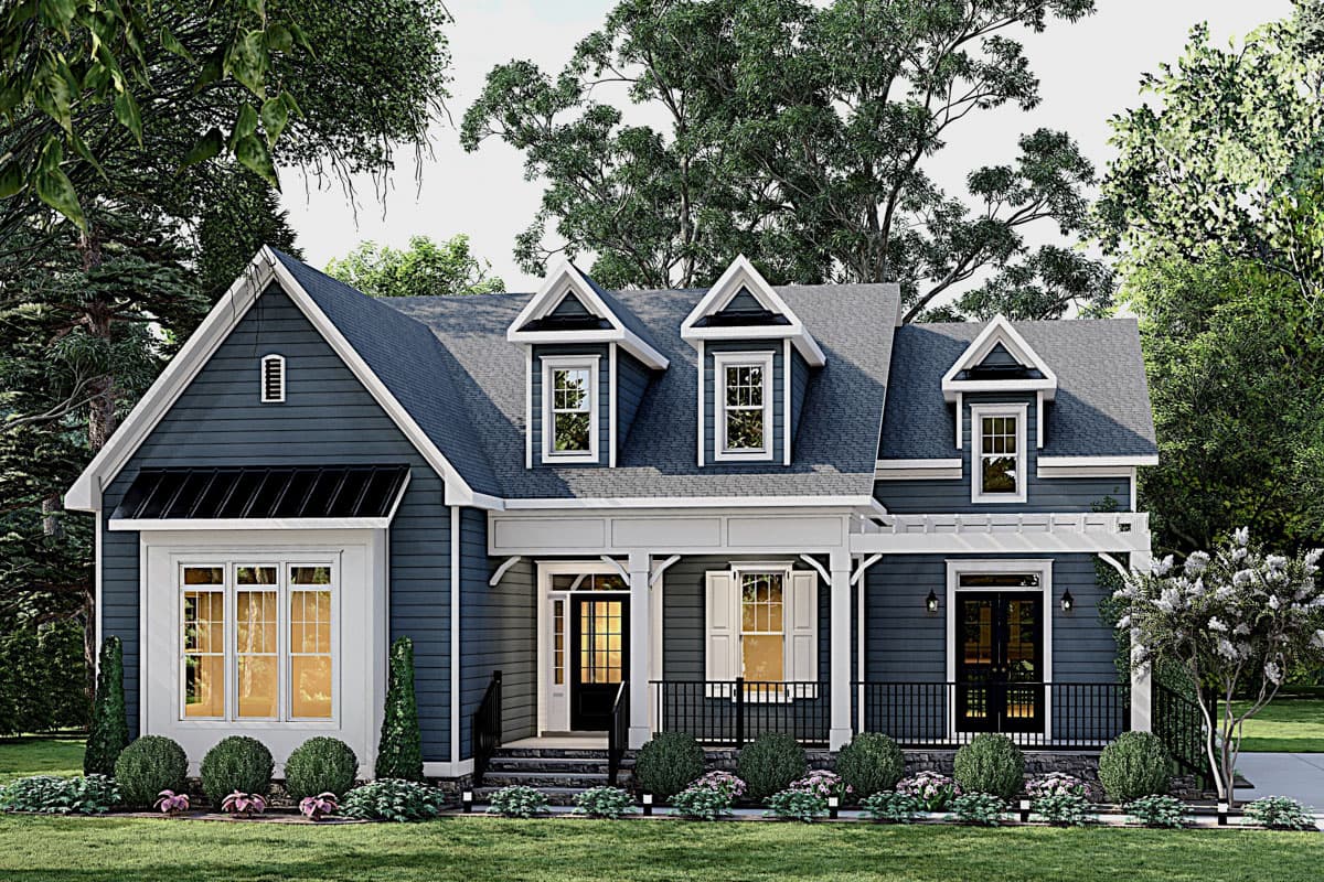 House plan exterior. Two-story home with a Craftsman style. Features include gabled roof, dormers, and a front porch.