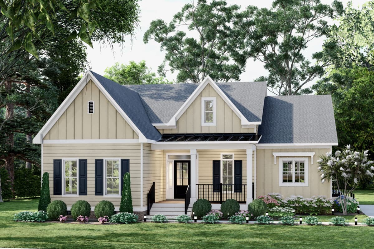 House plan exterior. A one-story house in a Cottage style with gables, a covered porch, and black shutters on the windows.