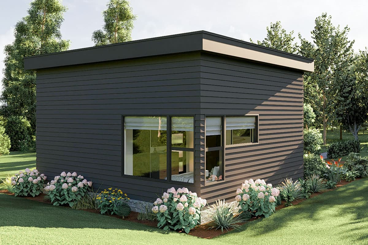 Modern house plan exterior with dark horizontal siding, flat roof, and corner windows.