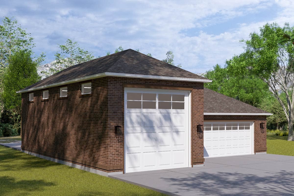 House plan exterior featuring a brick facade, a hip roof, and a two-car garage with panel doors and multi-pane windows.