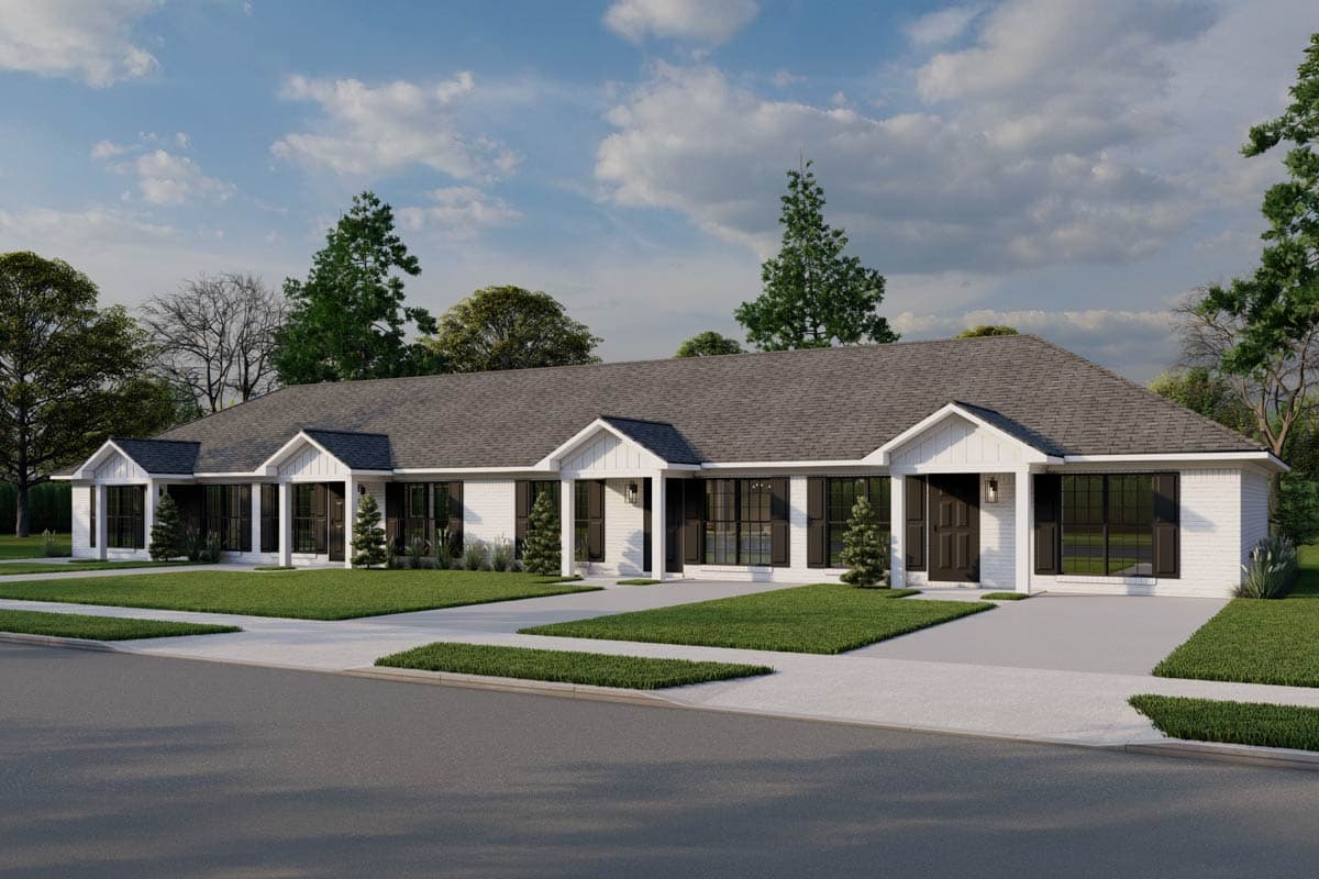 Modern Farmhouse style house plan exterior with white brick, multiple gables, and dark framed windows.