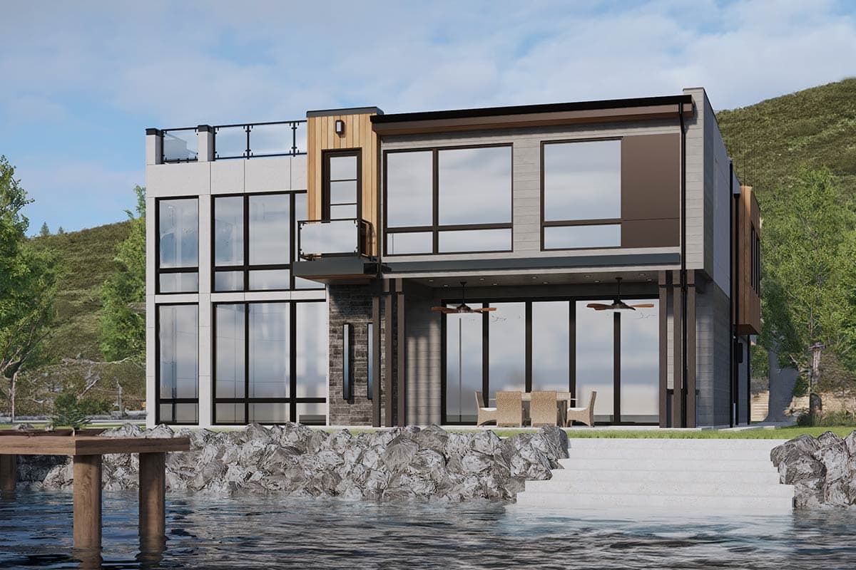 Modern two-story house plan exterior with extensive glass, cantilevered balconies, and rooftop deck overlooking water.