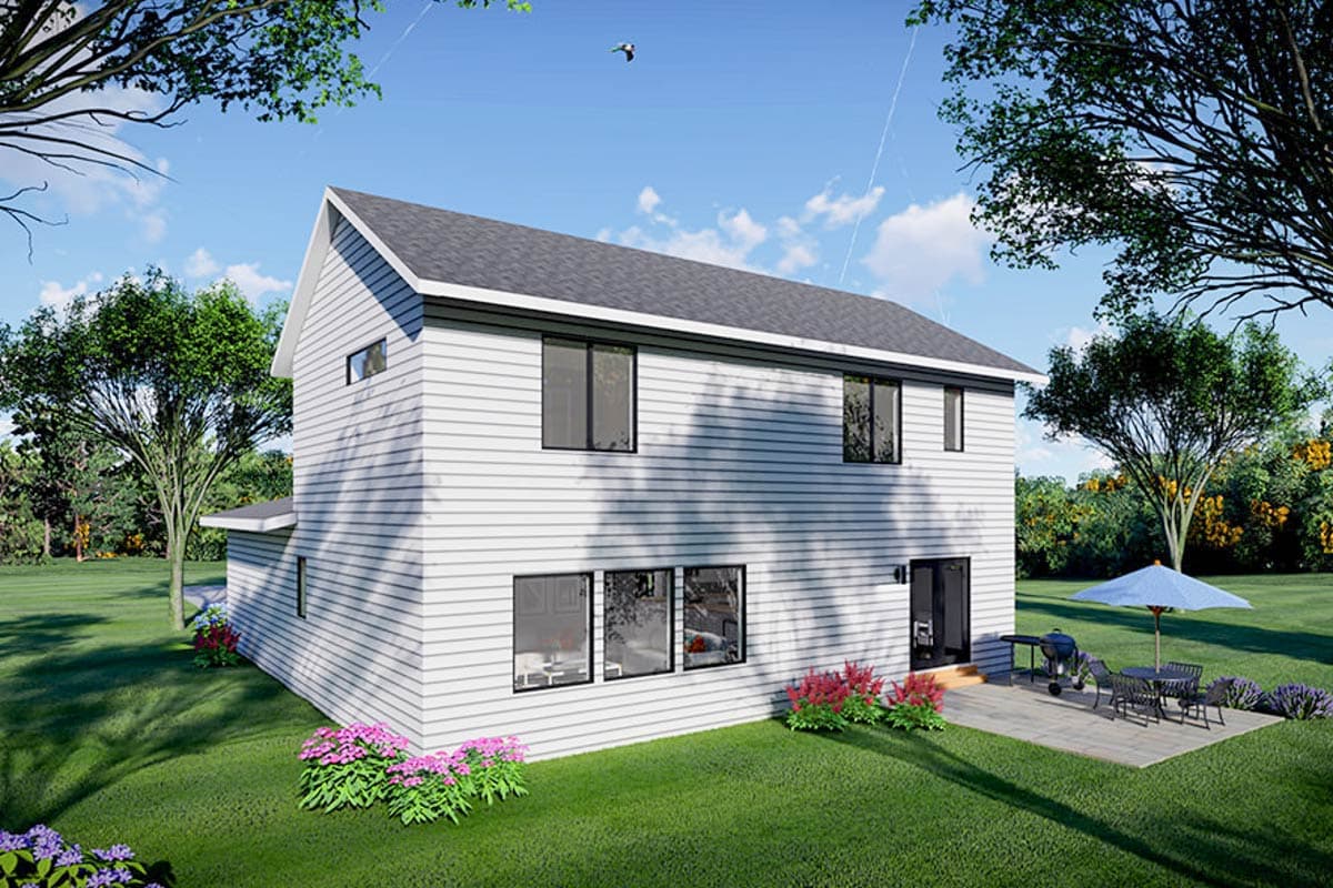 House plan exterior, two stories, white horizontal siding, gabled roof, patio with outdoor furniture and grill.