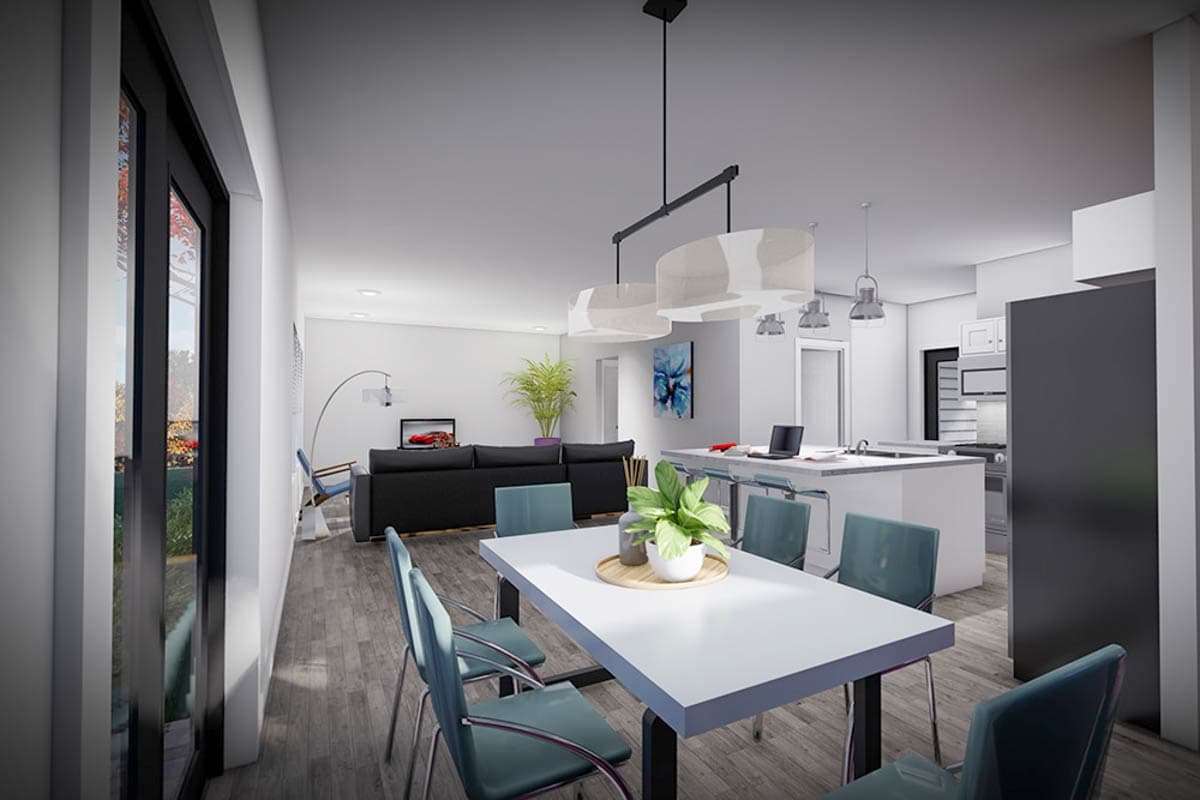 Open concept living space with dining area, kitchen island, and lounge area. Modern lighting fixtures.