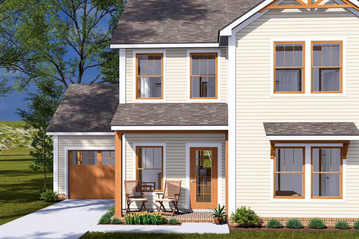 Two-story house plan exterior with attached garage, covered porch with seating, and multiple dormers.