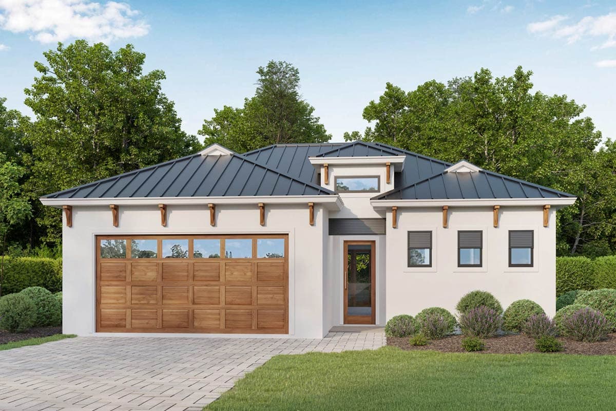 House plan exterior. One-story house with a metal roof, dormer, and attached garage. Includes decorative brackets and a wood-paneled garage door.