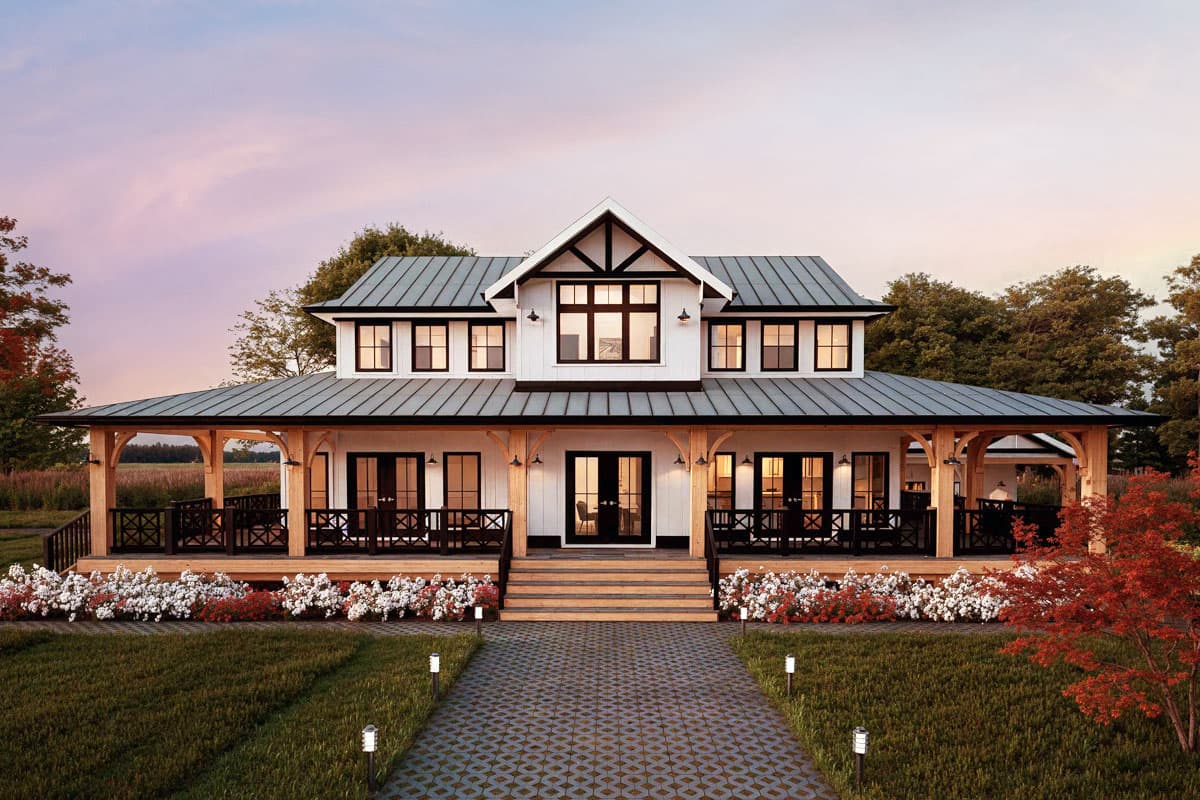 House plan exterior. Two-story Modern Farmhouse with a wraparound porch, gabled roof, and black-framed windows.