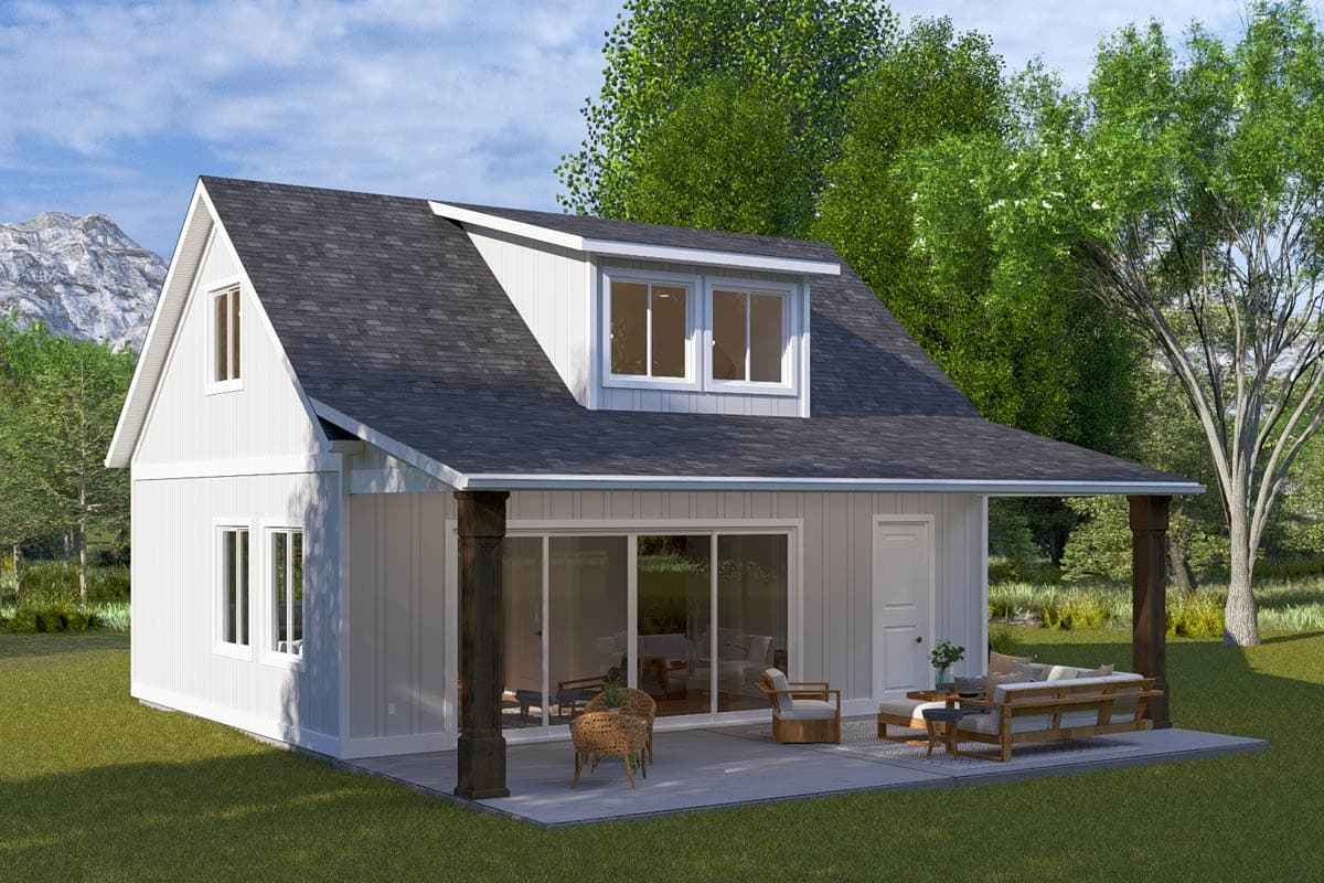 House plan exterior with two stories. Features a gable roof, dormer, and covered porch with timber supports. Includes a patio with seating.