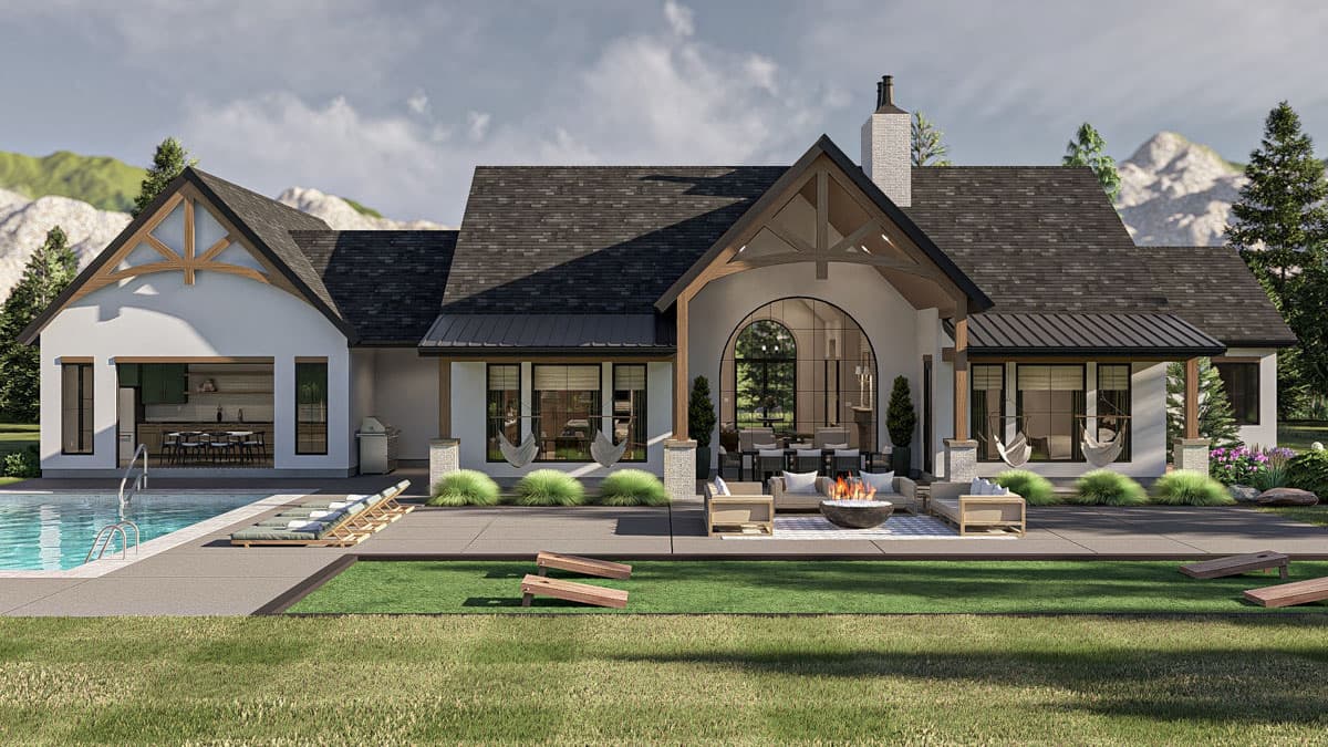 House plan exterior: Modern Farmhouse style with exposed wood beams, gable roof, arched window, and covered patio with outdoor seating.