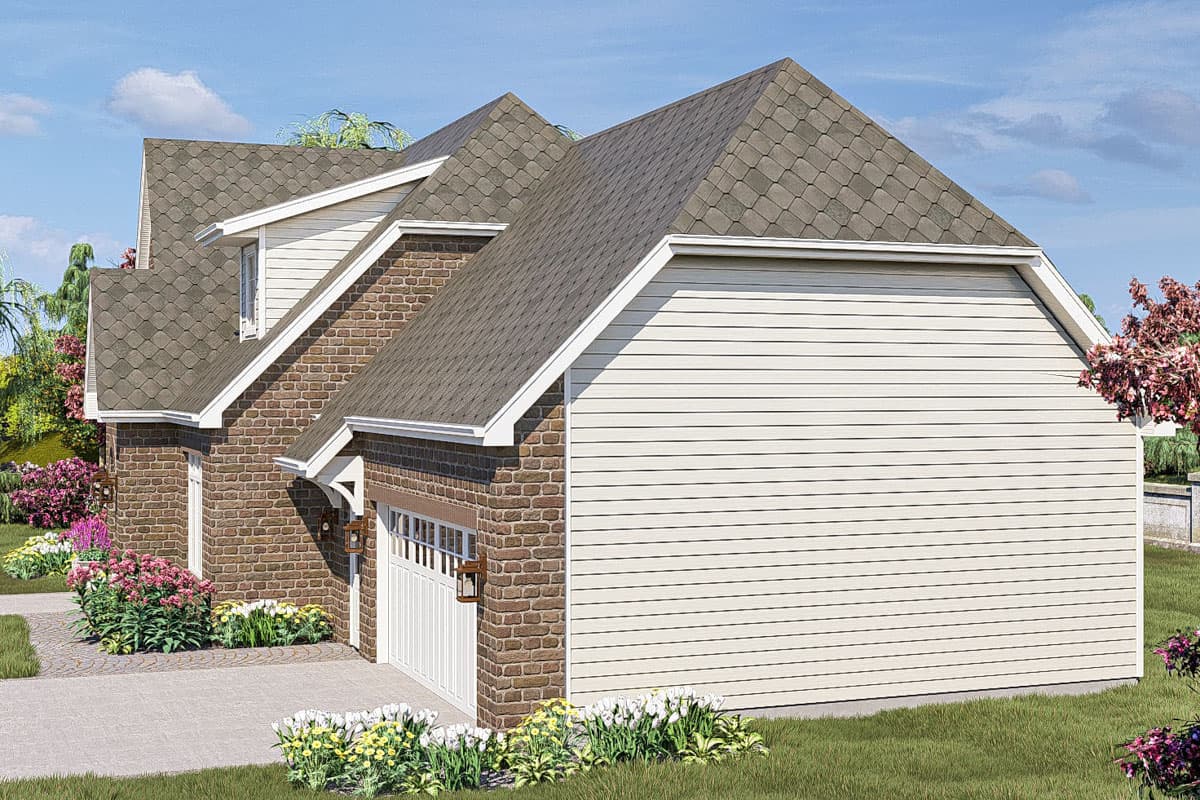 House plan exterior featuring brick and vinyl siding, gable rooflines, and a detached garage.