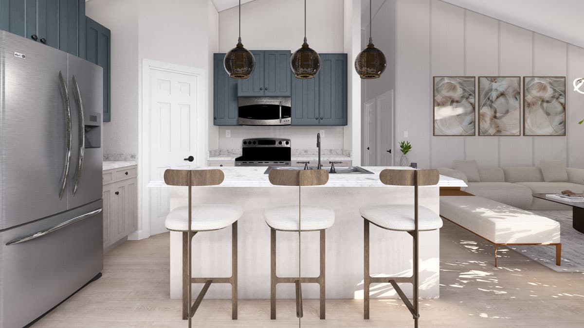 Open concept kitchen with island, bar stools, stainless steel refrigerator, and vaulted ceiling.