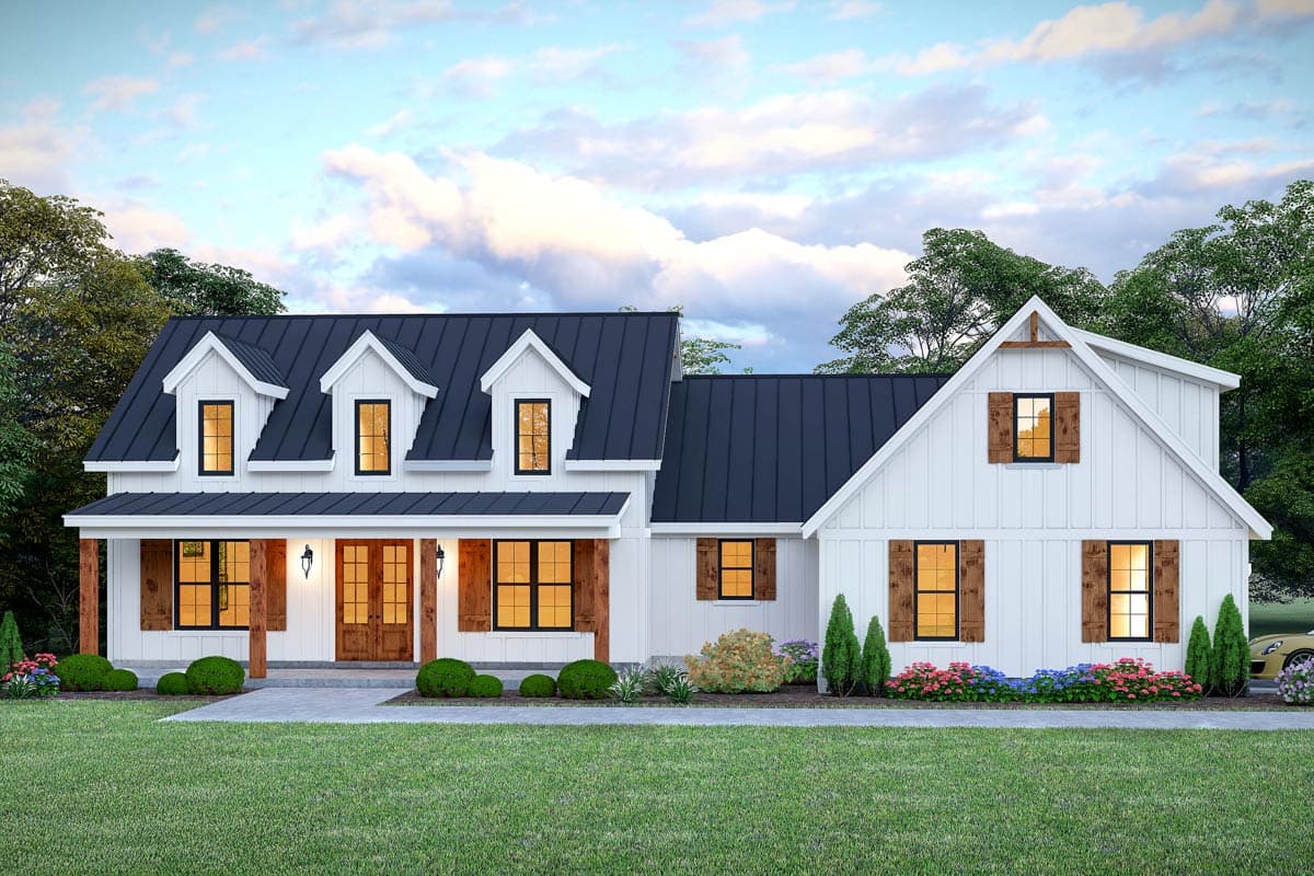 House plan exterior featuring a Farmhouse style with a front porch, gables, and a dark metal roof. Two story home.