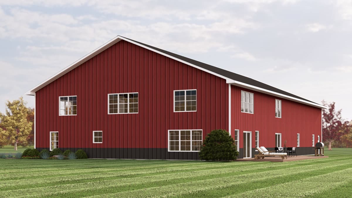 Red two-story barn-style house plan exterior with white-trimmed windows and a dark foundation. Includes a deck with outdoor furniture.