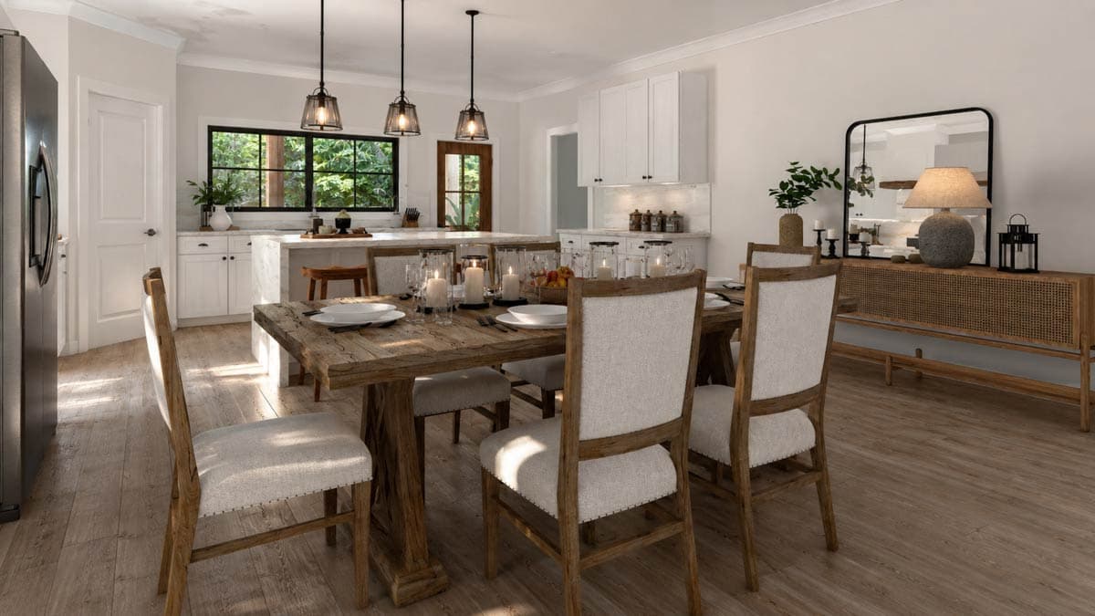 Dining room with island and kitchen view, featuring a rustic wood table, upholstered chairs, and pendant lighting.