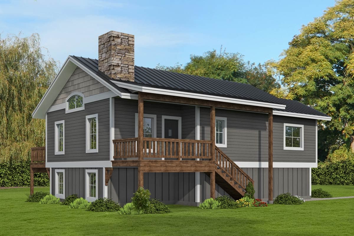 House plan exterior with stone chimney, two stories, covered porch, and gabled roofline. Gray siding with white trim and dark metal roof.
